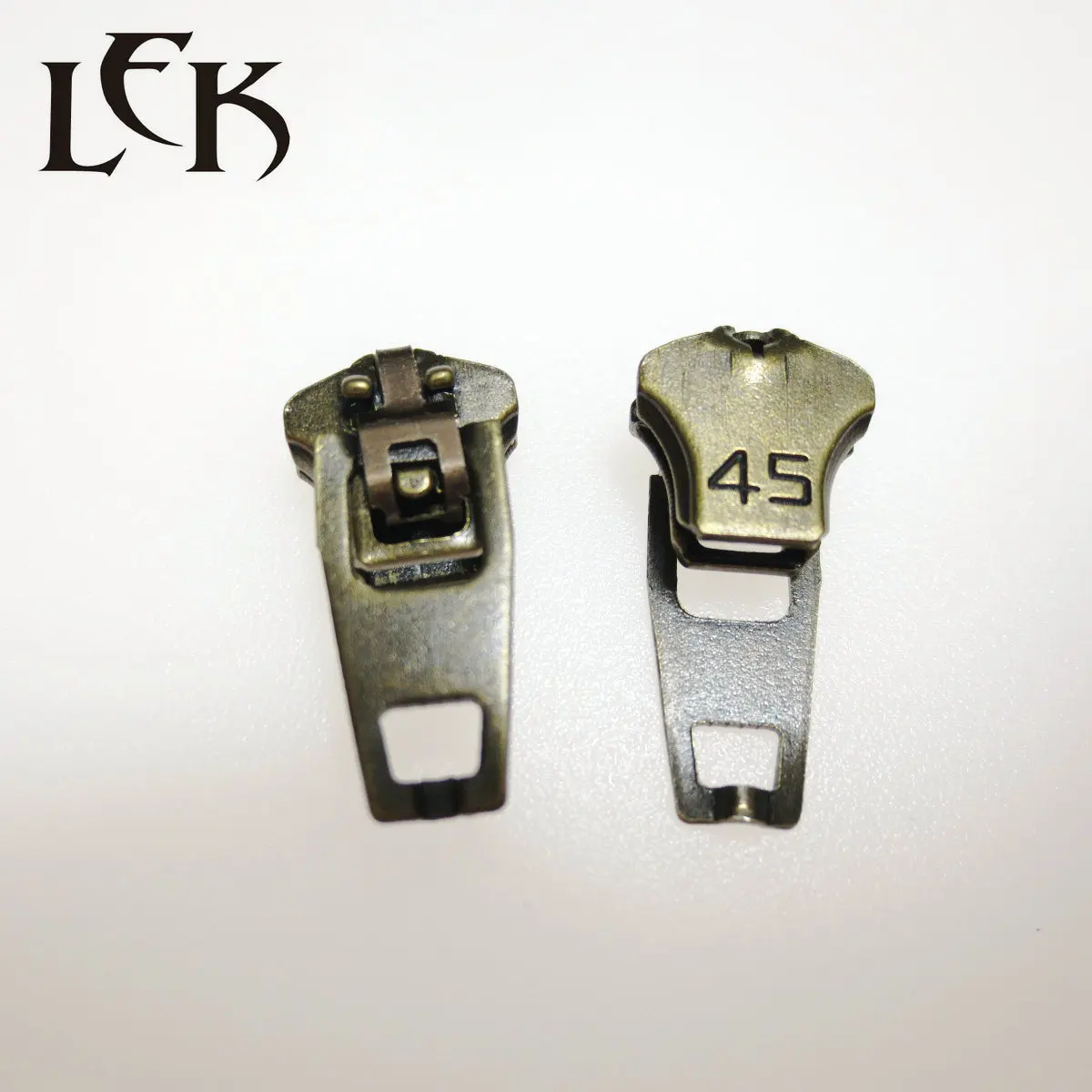 Hot selling professional manufacture lowest price antique brass 4.5YG iron slider zipper