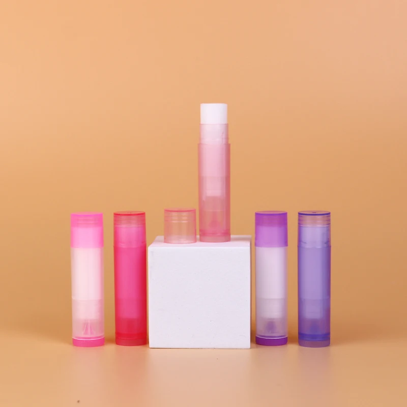 Hot Sale Sunscreen Plumping Vegan Waterproof Beeswax Lip Gloss Oil Organic Moisturizing Vanilla Long Lasting Lip Balm with Logo