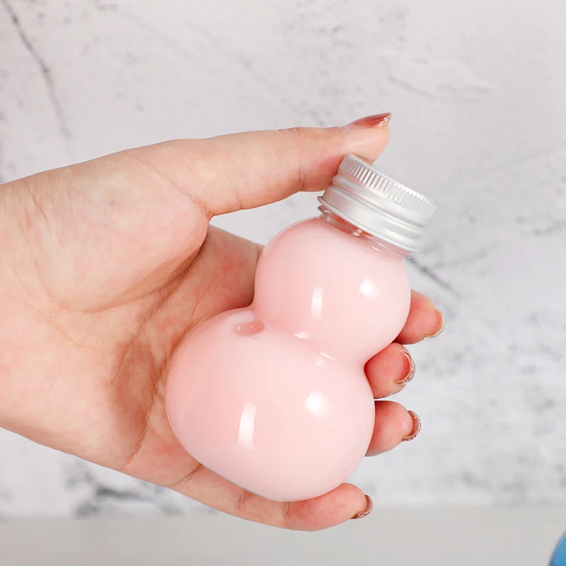 Wholesale PET 100ml 200ml 300ml transparent gourd type plastic juice bottle bulb beverage soda bottle