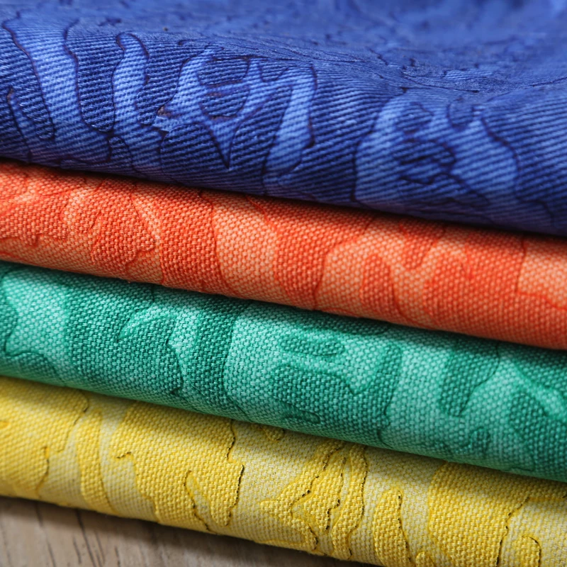 Orange camo  3D three-dimensional scraping embossed printed polyester canvas fabric bright camouflage canvas handbag fabric