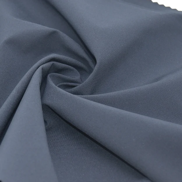 Polyester four-sided elastic TPU knitted fabric three in one composite film cold protective clothing fabric