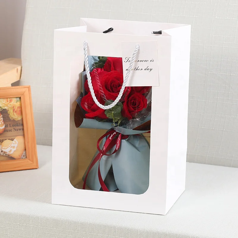 2022 new design factory direct sale luxury Christmas gift door transparent bouquet portable paper bag