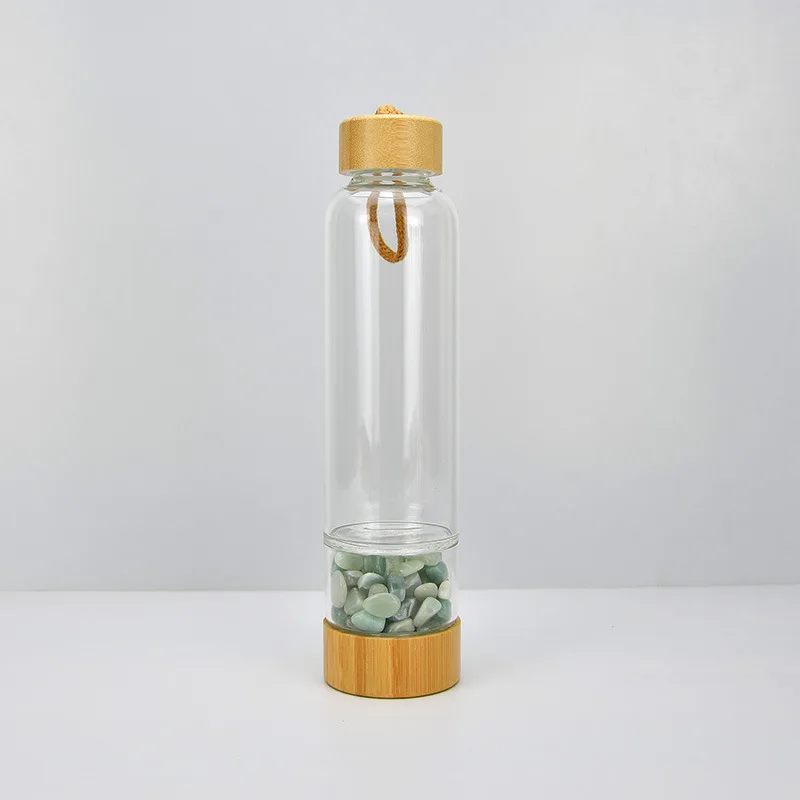 High Quality 17OZ Natural Crystal Infused Glass drink Water Bottle Bamboo Lid Gemstone Water Bottle With Crystal Inside