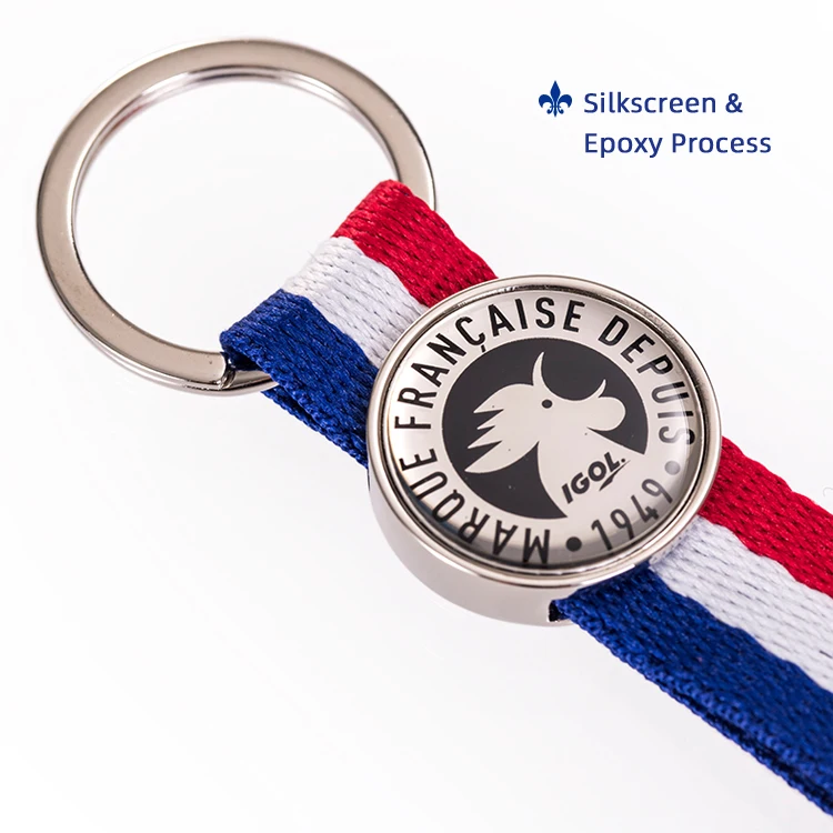 Hot Sale Twill Fabric Customized Own Trademark Merrow Border Flash Plain Embroidery Keychains for Clothing