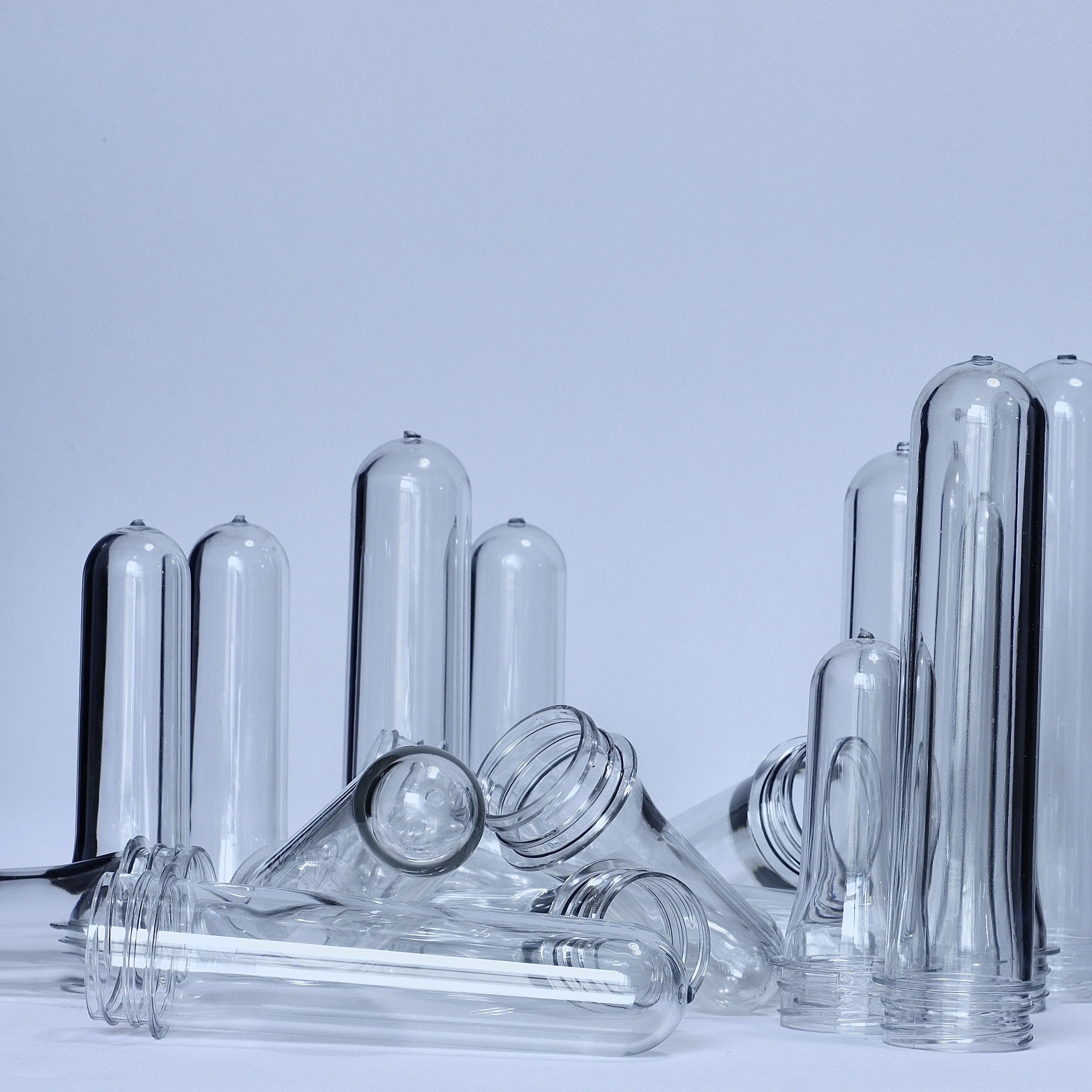 Factory Price 1 Liter Plastic Bottles 30g 32g Water Bottles Containers Tube 38mm 3 Start PET Plastic Bottle Preform With Lids