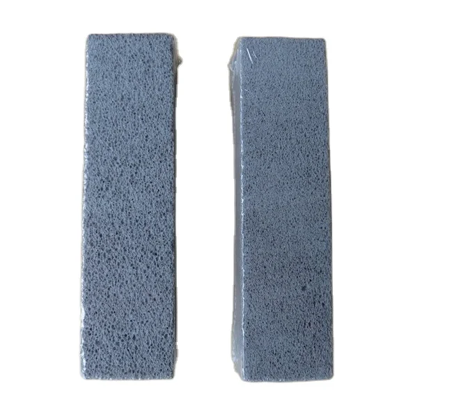 toilet pumice brush stone with the white plastic handle