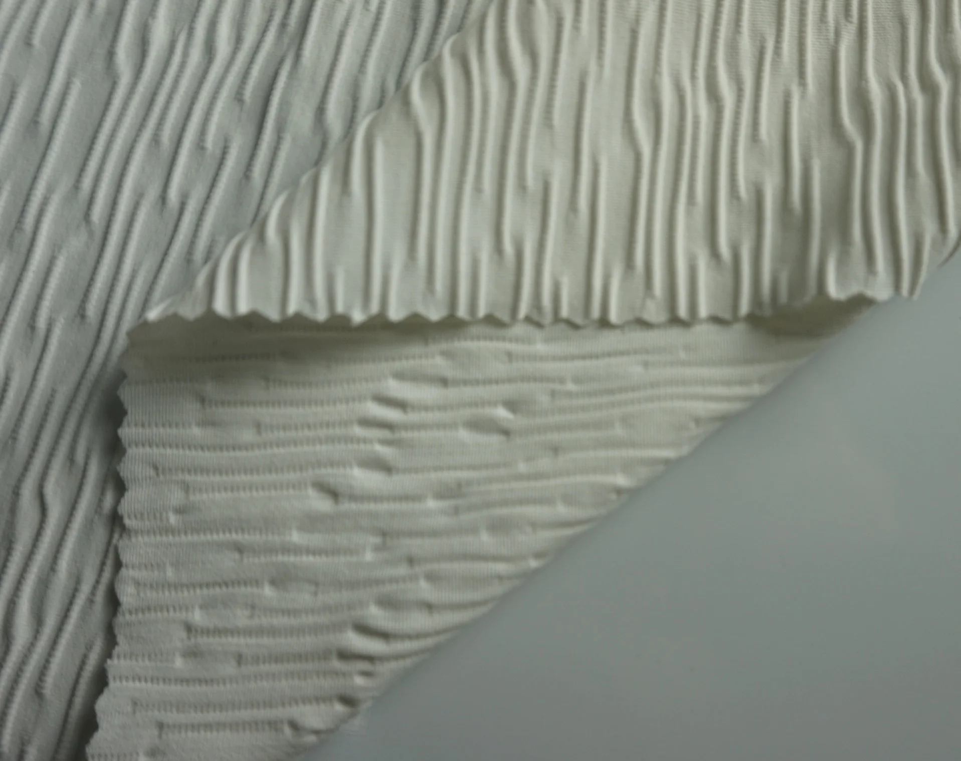 white solid short lines regular pattern textured 3D jacquard 4 way stretch polyester fabrics swimwear nylon spandex fabric