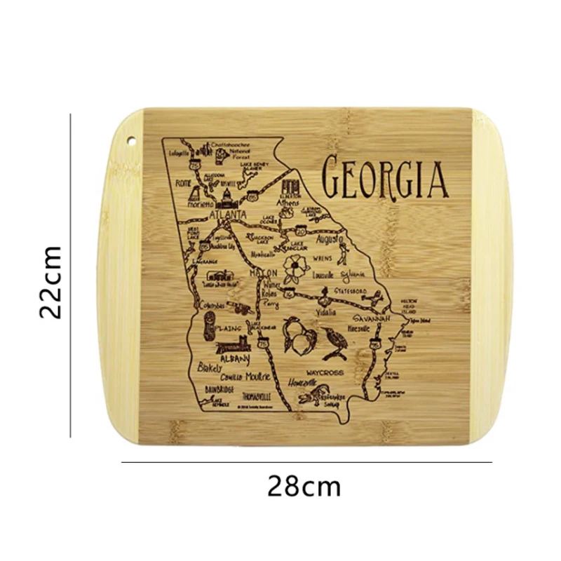 A bamboo cutting board with a laser pattern on a Georgia city