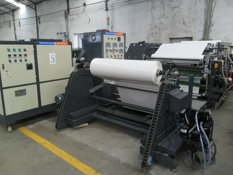 Porous elastic adhesive bandage coating machine