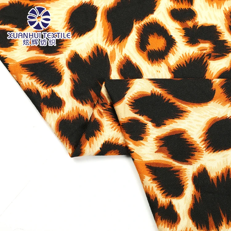 
Xuanhui Textile Printed Knitted Fabric Tiger Animal Skin FDY In Stock Polyester Four Way Stretch Spandex Fabric 