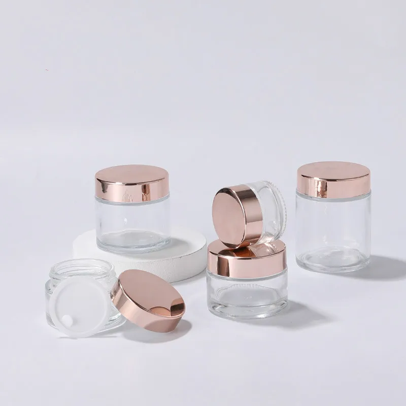 
cosmetic cream clear glass 50ml jar with silver gold and rose gold covers 