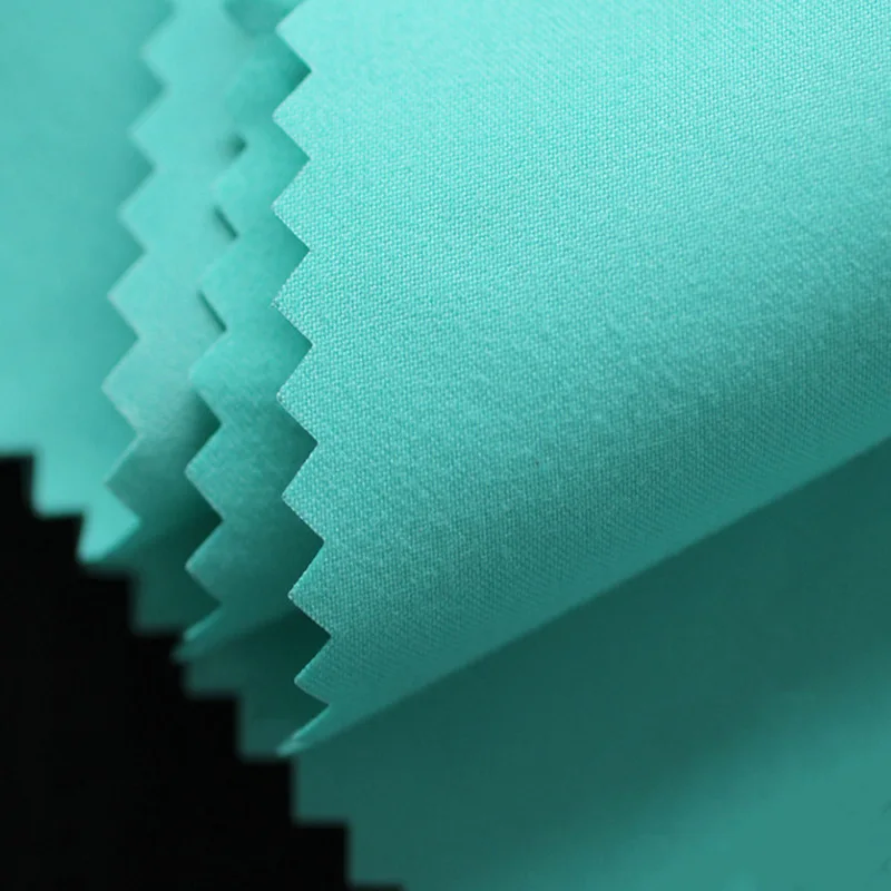 140G Peached 100% polyester microfiber fabric for jacket board shorts polyester peach skin fabric for beach shorts