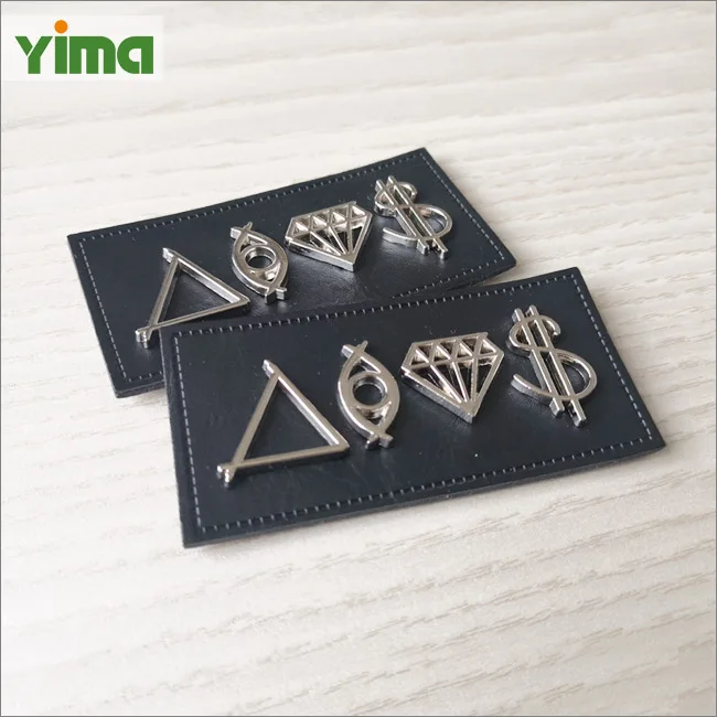 China maker custom metal logo tag badge with PU label metallic label logo for handbags and clothing