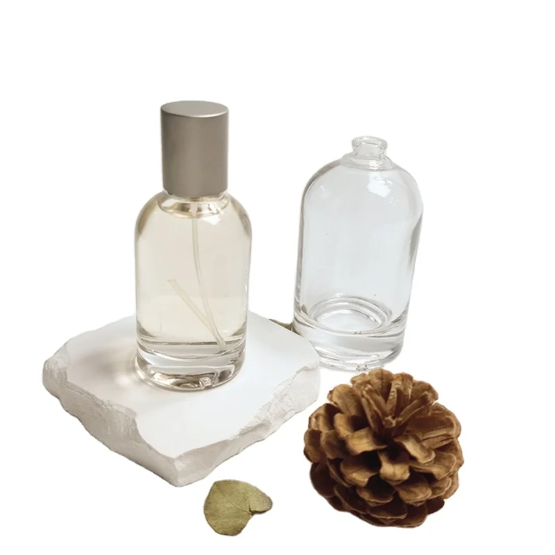 Wholesale High Quality 30Ml 50Ml 100Ml Round Glass Bottle Fashion Perfume Bottle With Sealing Cover