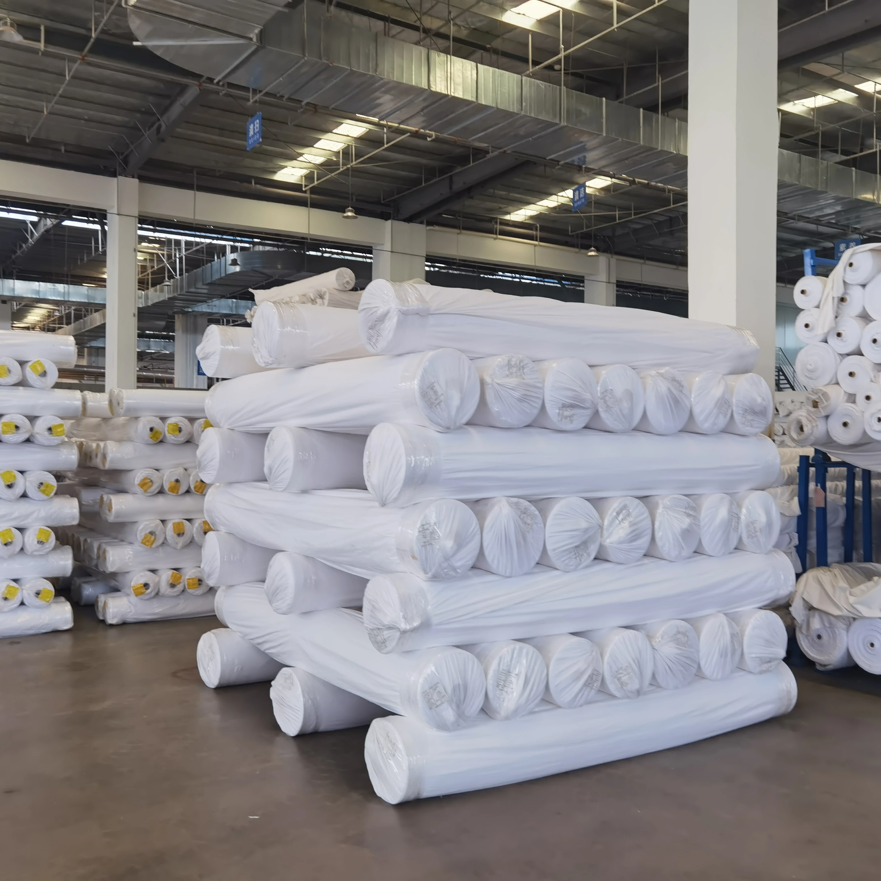 Cheap Factory Price printed 100 polyester embroidered fabric tela acolchada rollos de telas por mayoreo tela bramante para saban