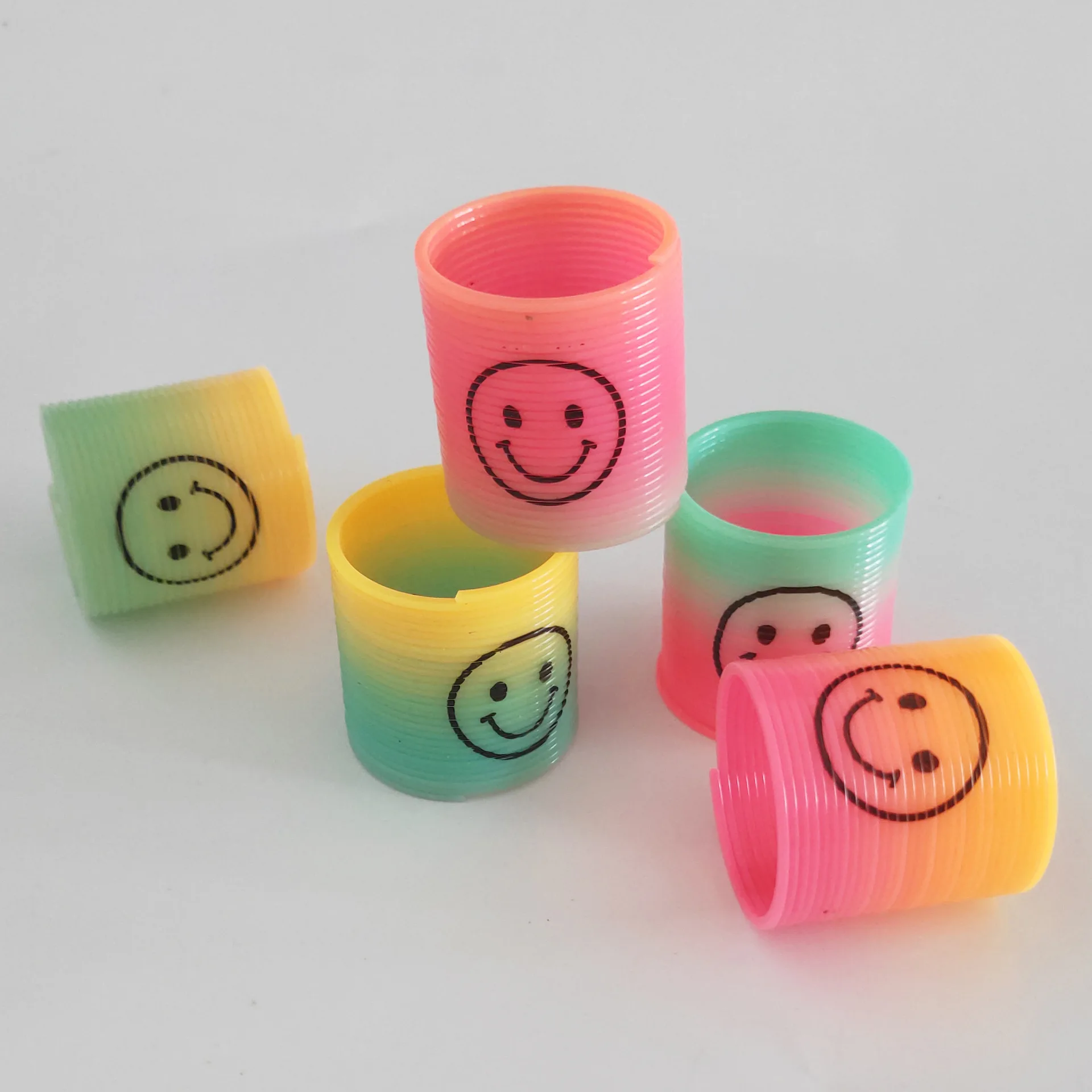 Small Plastic Rainbow Smiling Face Spring Coil Toys Magic Spring classic Educational Gift For Kids