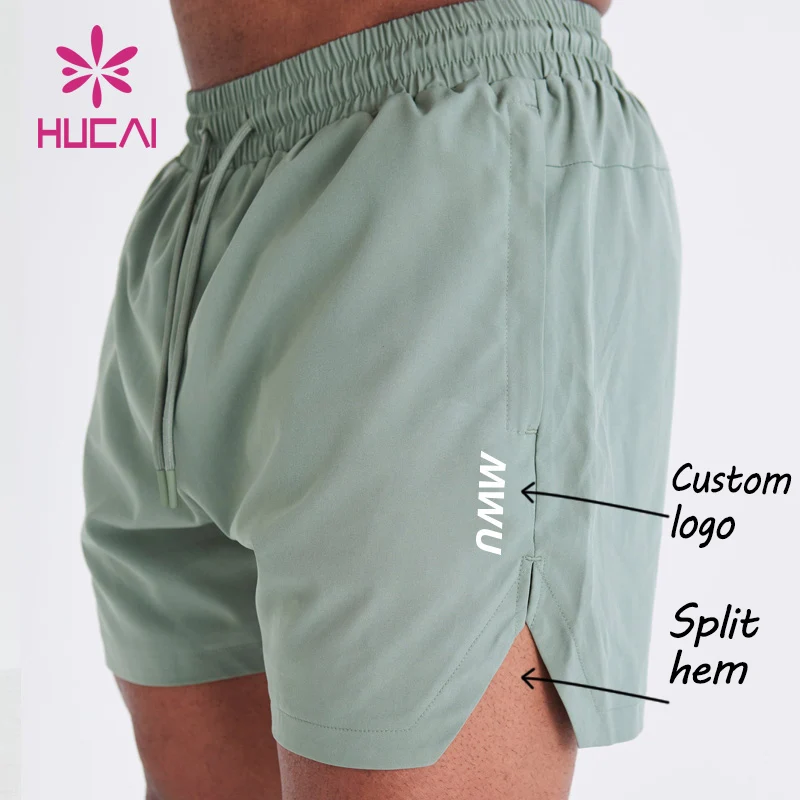 HUCAI custom logo stretch polyester spandex breathable active Athletic split Hem workout mens sports fitness running gym shorts