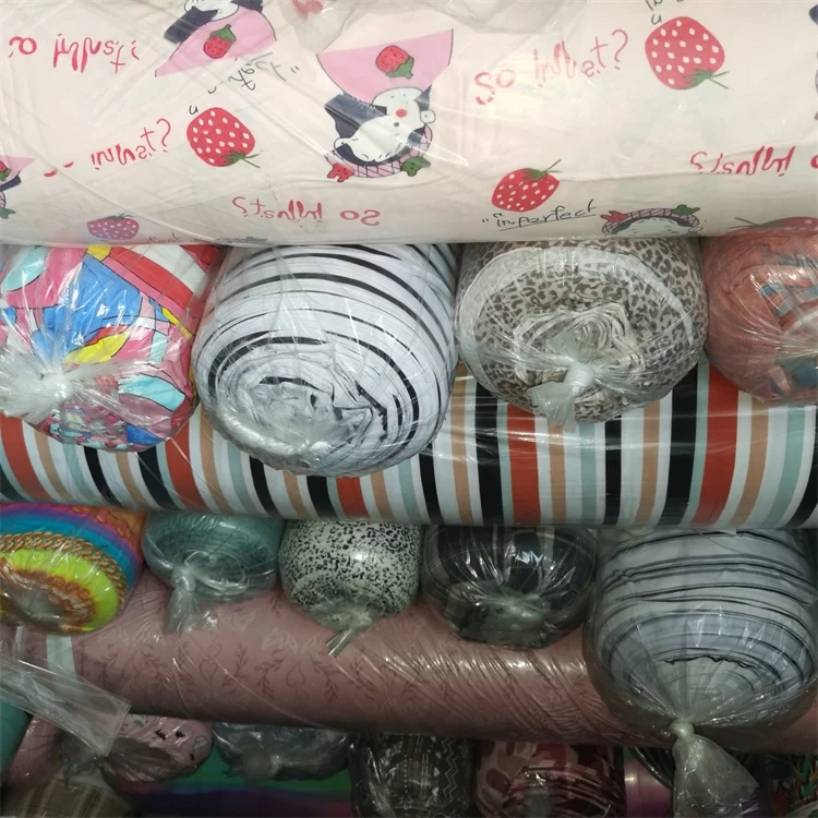 China 140-180 Polyester DTY Brushed Four Way Stretch Knit Printed Stock Fabric For Garment