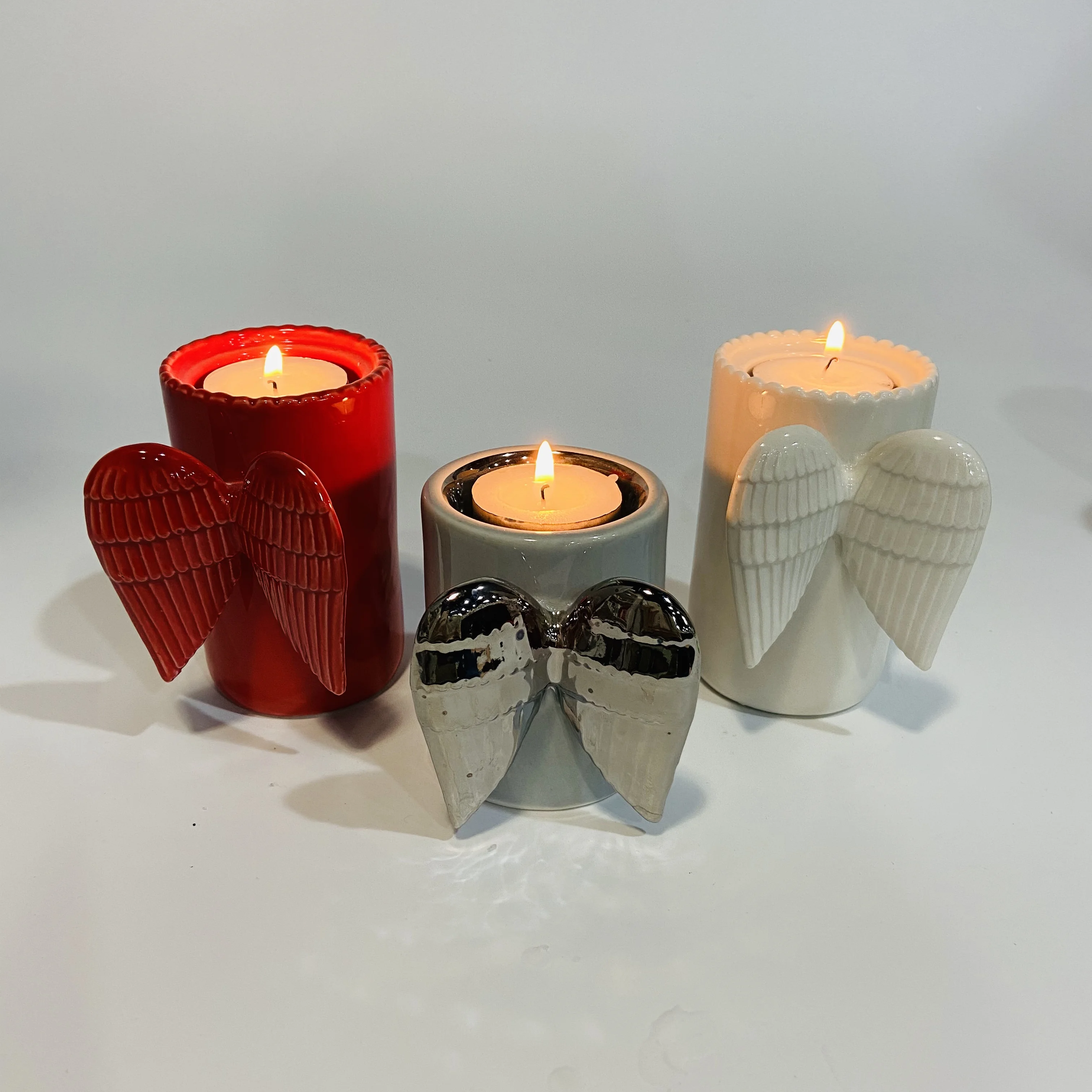 
Best selling angel wings decor ceramic candle cup holder 