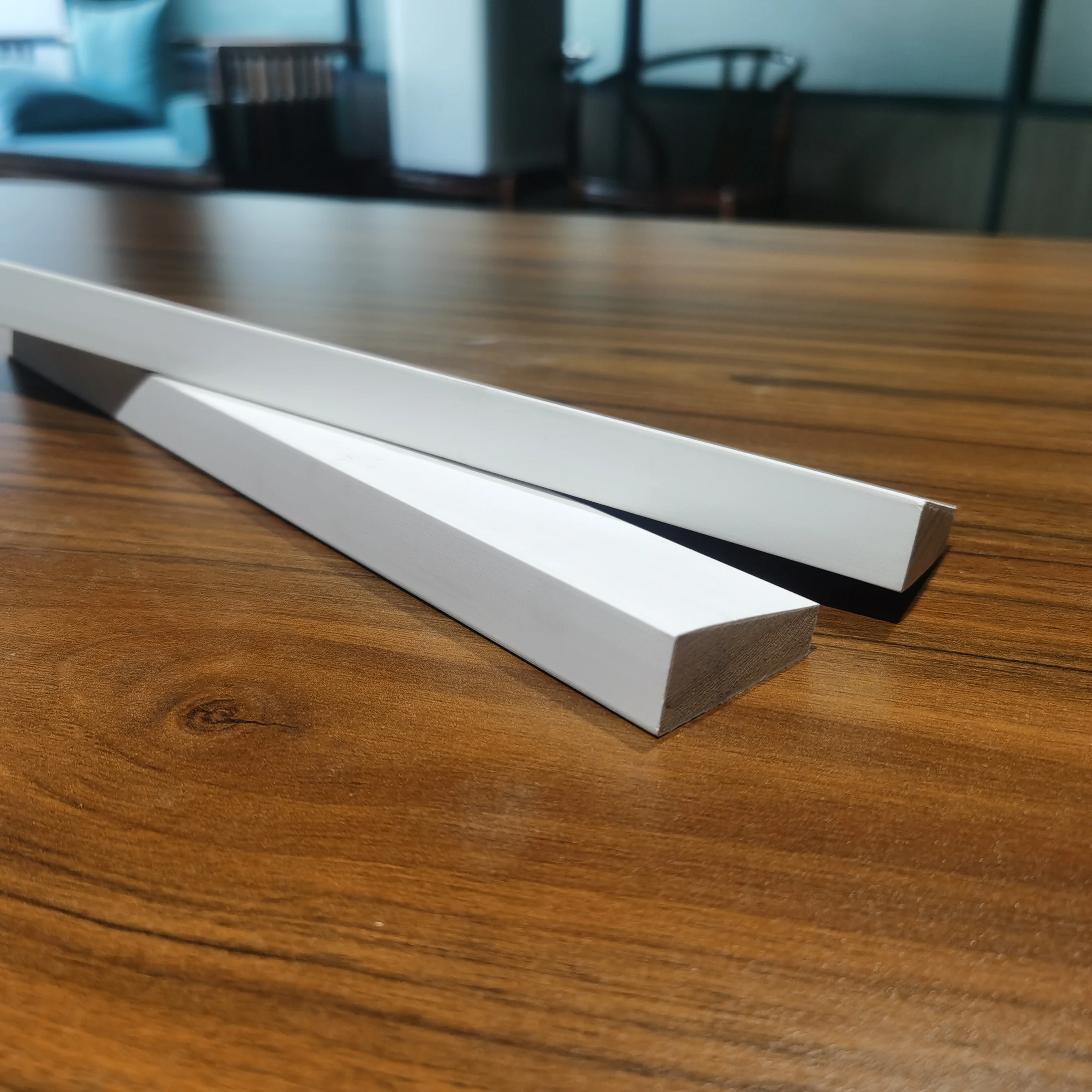 white primed wooden window sill wooden panel door skirting moulding wood frame