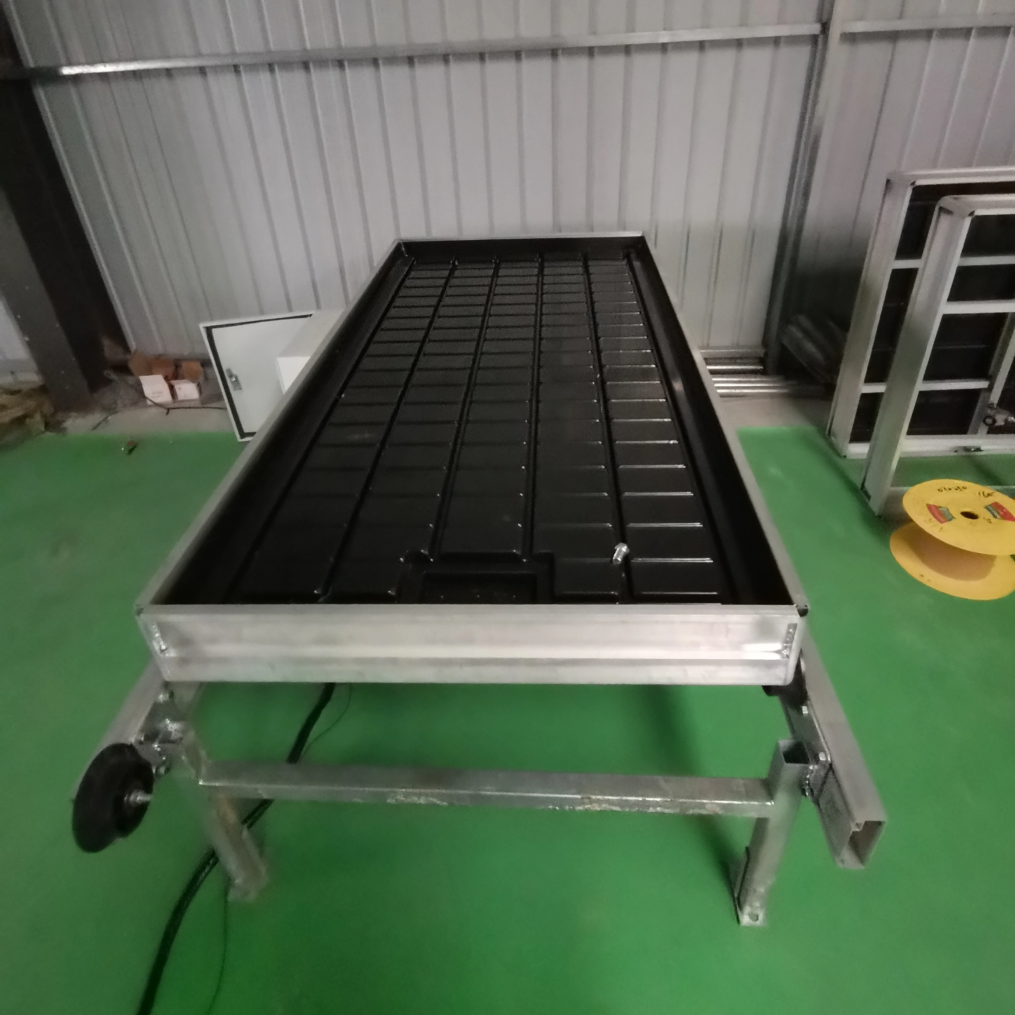 greenhouse  table seedbed ebb and 4x8 flow rolling grow bench video