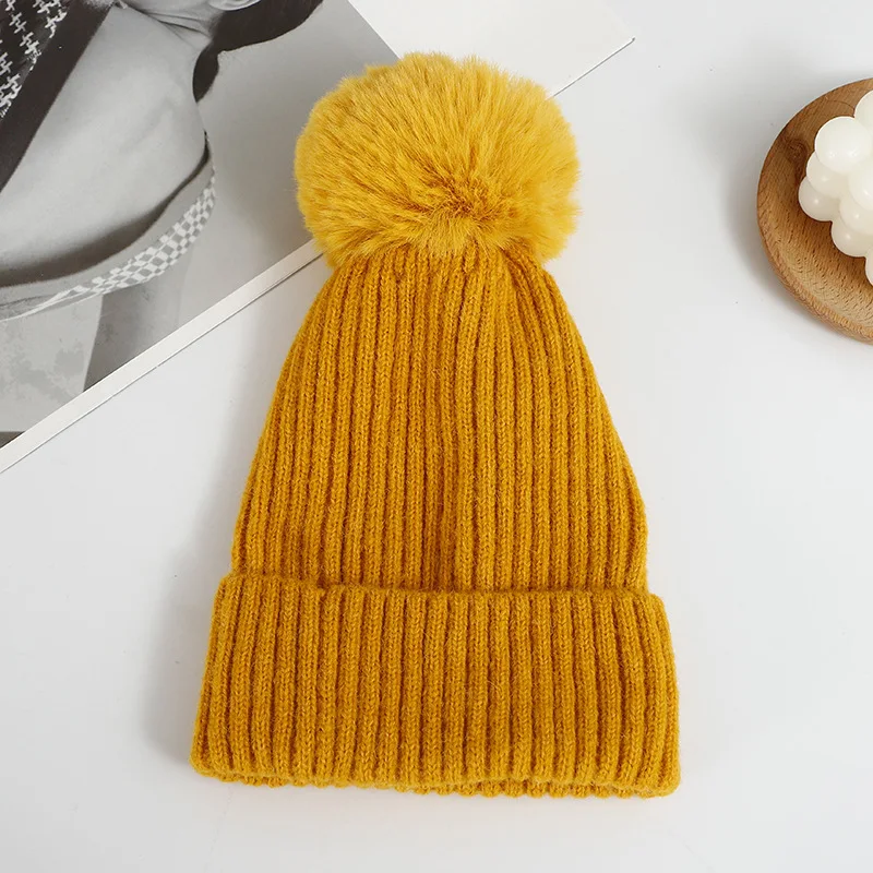 Autumn and winter double knitted running skiing knit cap Warm simple fashion solid color versatile wool beanie with Pom Pom