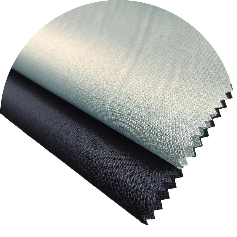 Ocean Plastic Recycled Fabric Ripstop Dobby Pongee Fabric PU Coated 65GSM Used For Casual Jacket