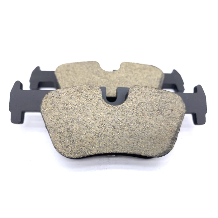 Carbon fiber brake disc pad with shims