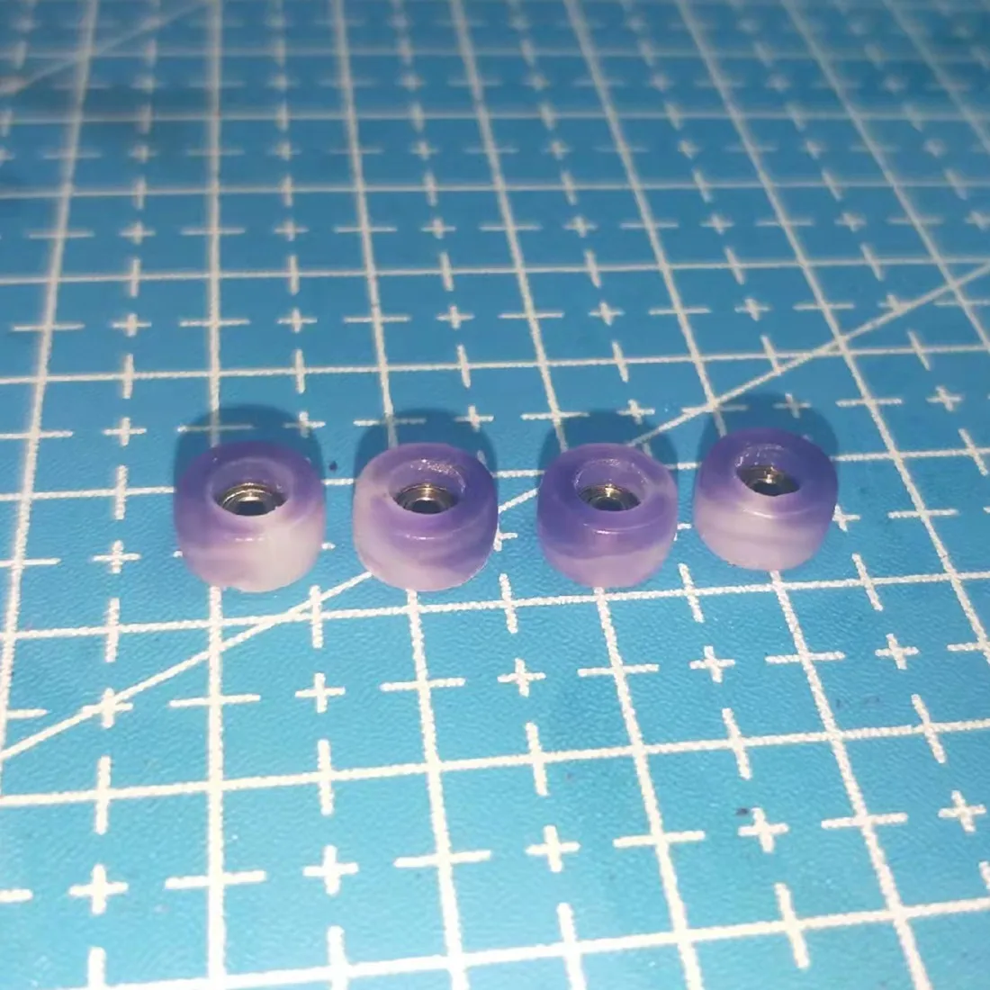Purple white handmade fingerboard wheels
