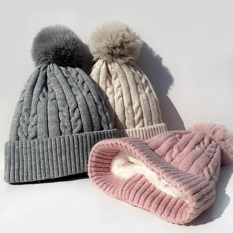 Wholesale Custom Knitted Beanie Warm Fleece Lining Women Cap Cable Faux Fur Pompom Winter Hat