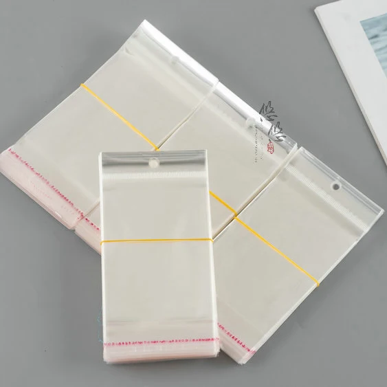 Stock wholesale resealable plastic self adhesive clear opp bag for small gift jewelry earrings packaging