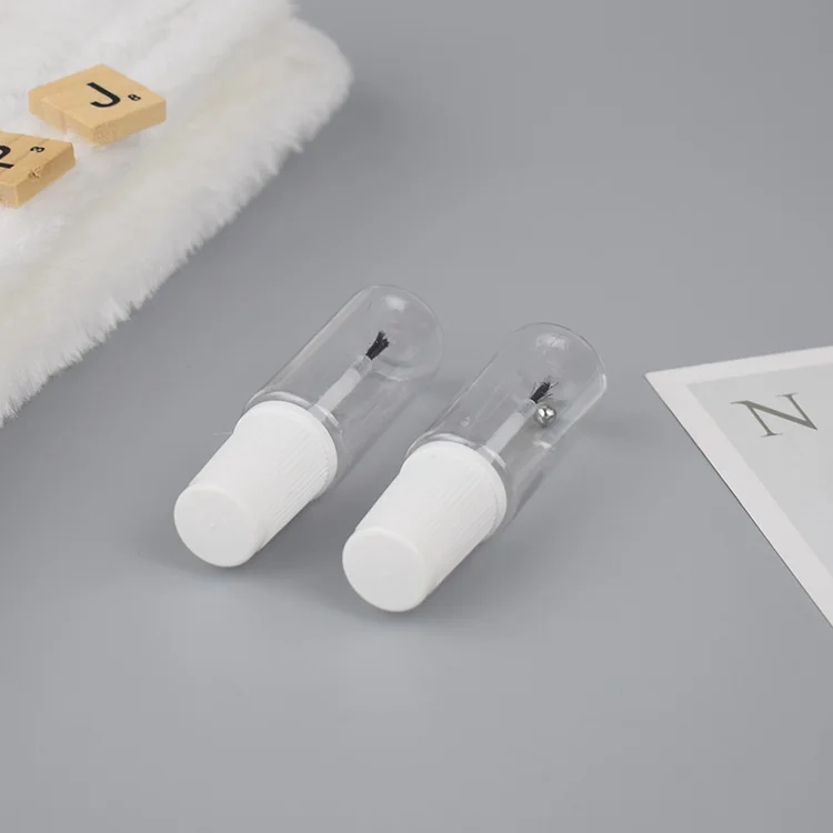 Empty  car repair paint  rpet  bottle with mixing ball and brush