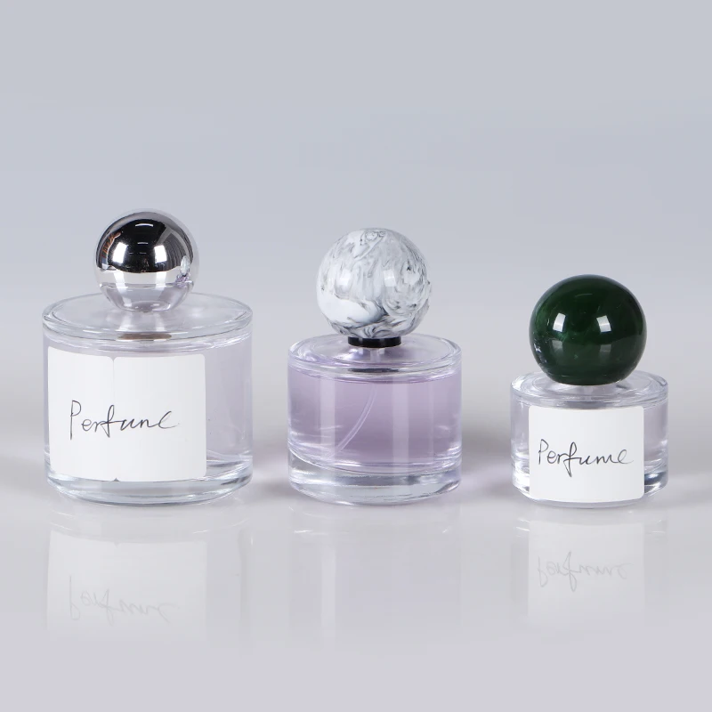Suppliers price cylinder 100ml clear spray glass perfume bottle spray pump bottle with box