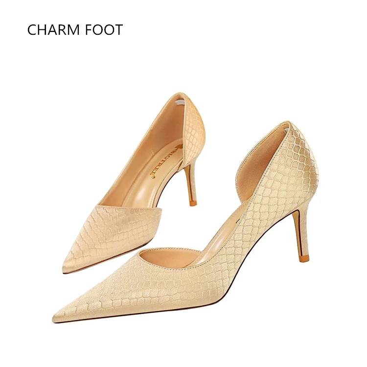 European and American Fashion Sexy Slim Heel High Heel Shallow Mouth Pointed Side Hollow Side Serpentine Silk Single Shoes