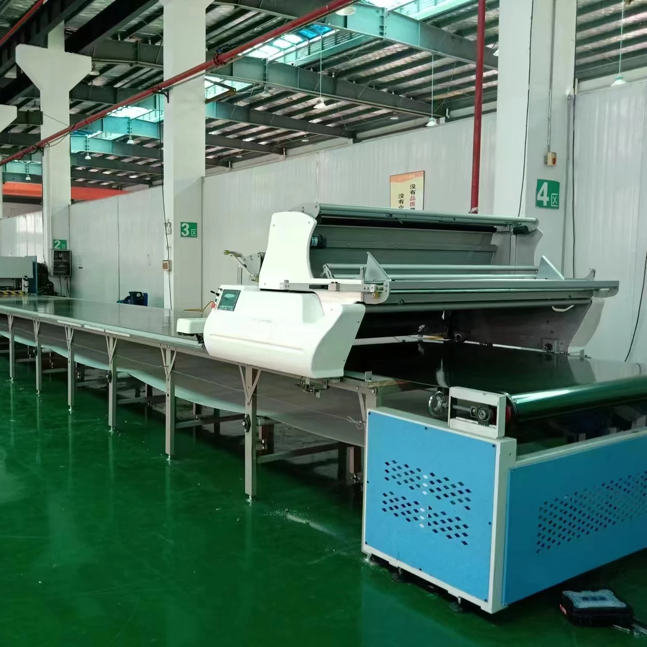 automatic cloth paving machine