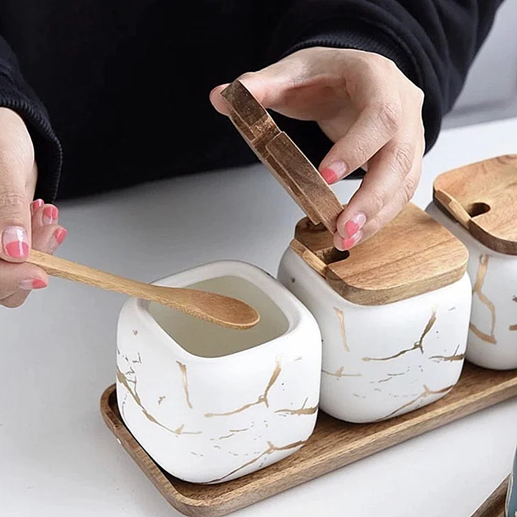 
Wholesale sugar spice salt seasoning condiment kitchen storage jar set marble ceramic spice jar with wood lid and tray 