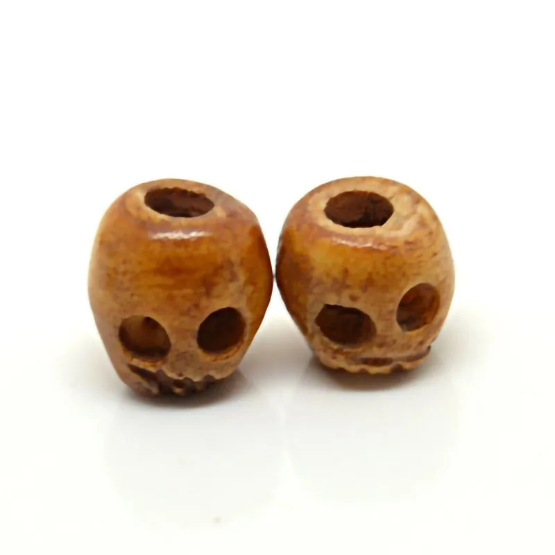 Hot sale cheap all sizes hand carved skull head bead natural cattle bone spacer skull beads for jewelry making