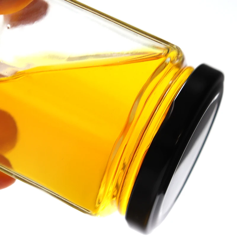 Cheap Spice Bottle Storage Hexagonal Honey Jam Food Small glass bottles for honey packing with Lid