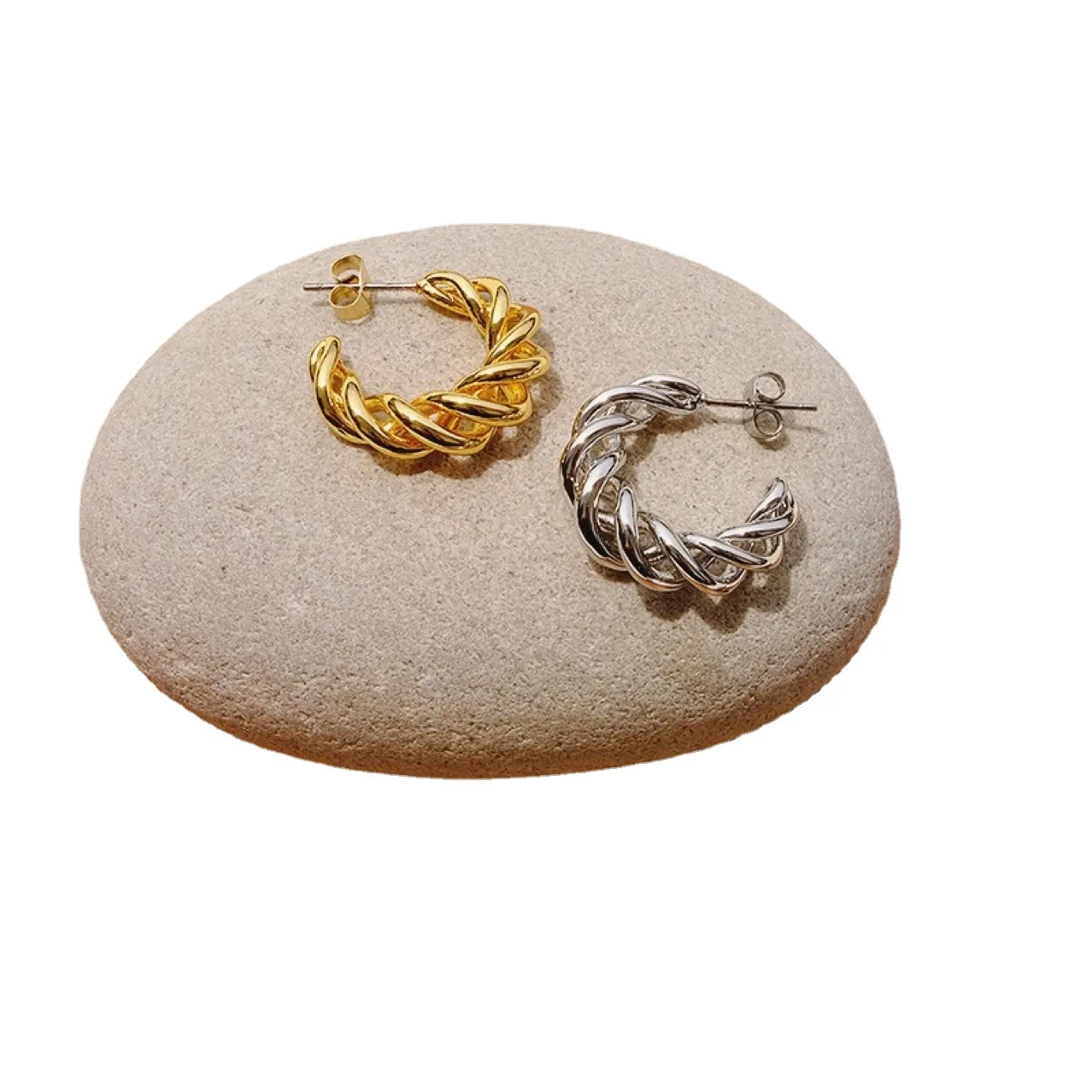 Gold titanium steel twist screw earrings Europe and the United States gold-plated circle line winding manufacturers who