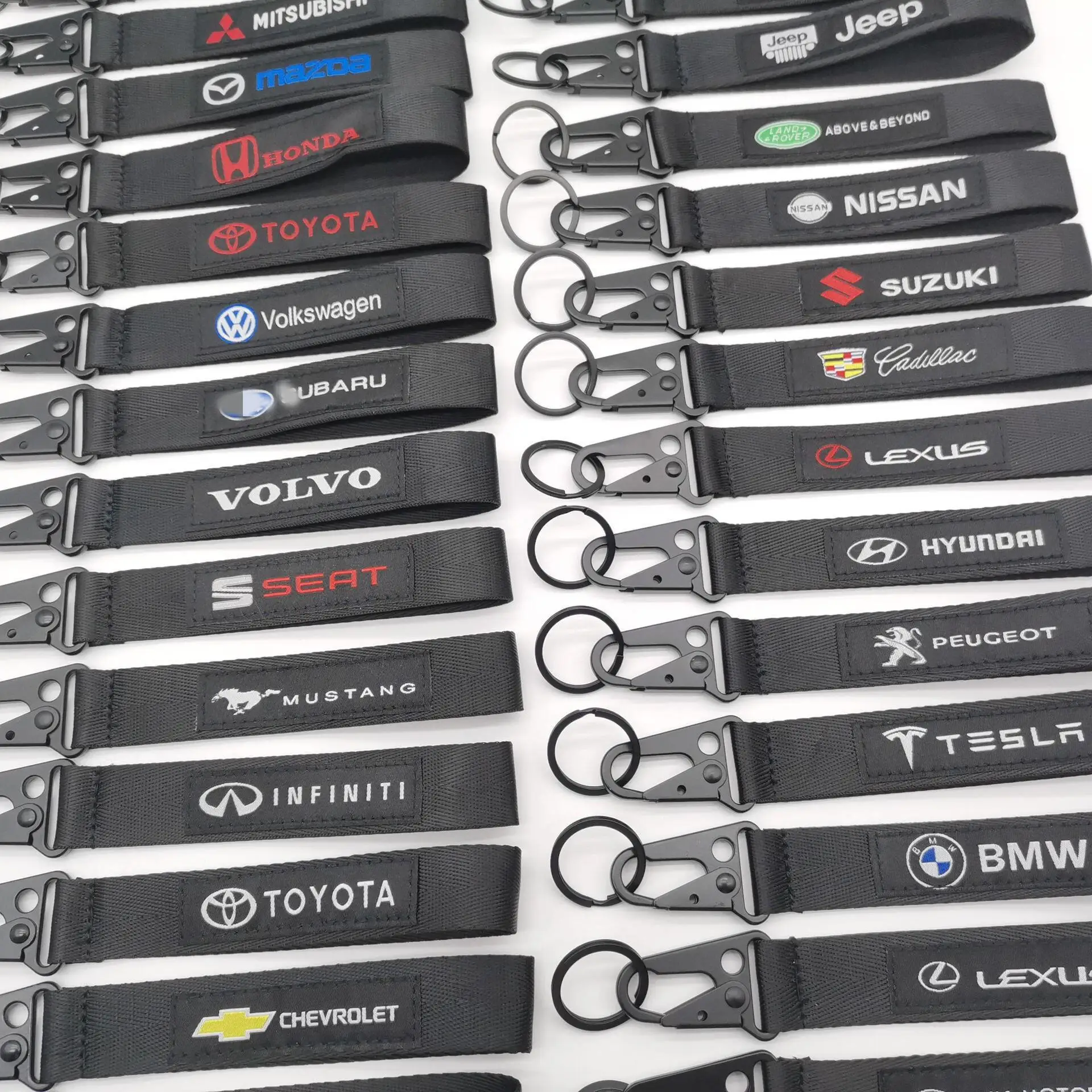 Black car logo embroidery, computer embroidery, car stitching, eagle mouth buckle, keychain, wrist strap, rope, and security key