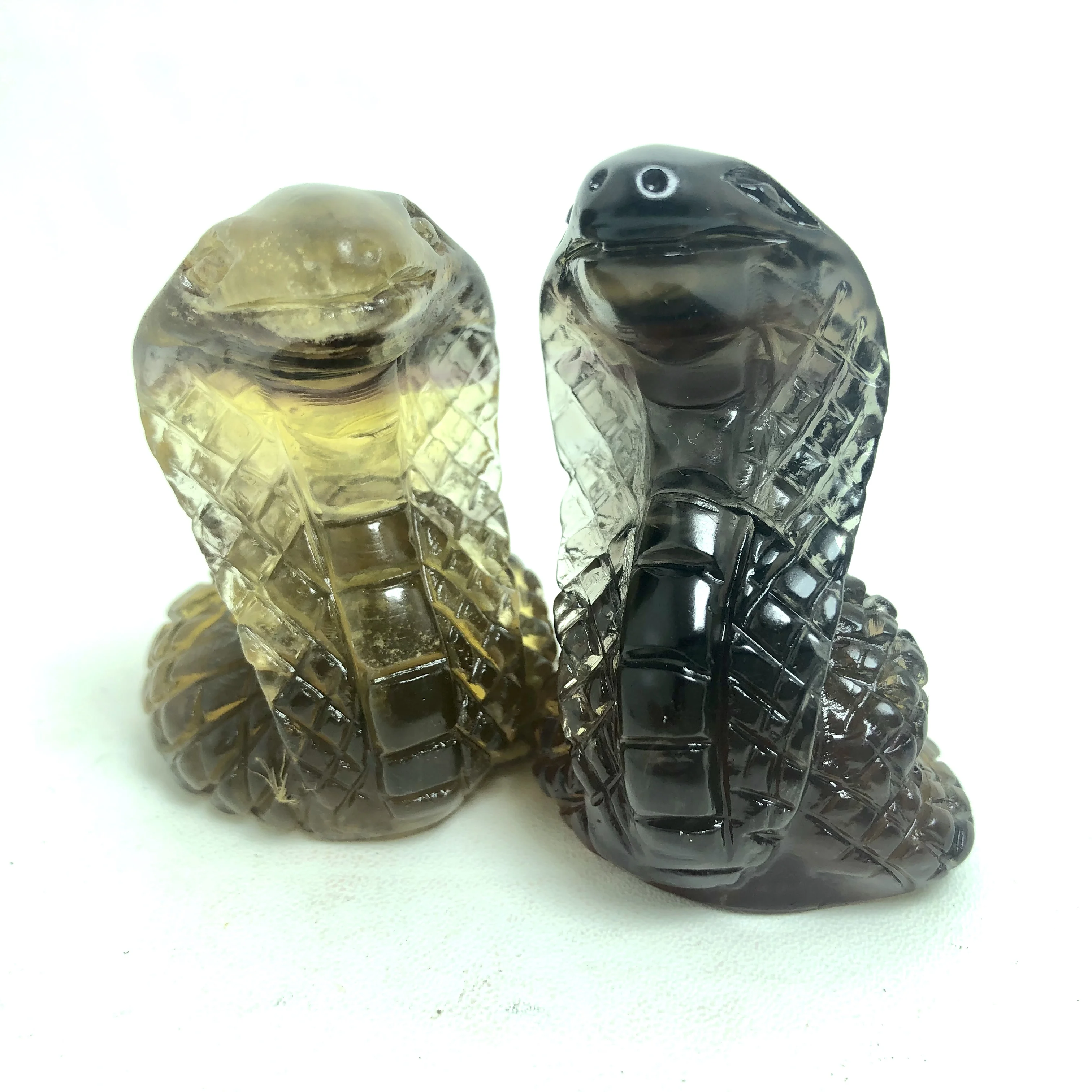 
Fantastic Quality Hand Carved Smoky Quartz Skulls with Coiled Snake 