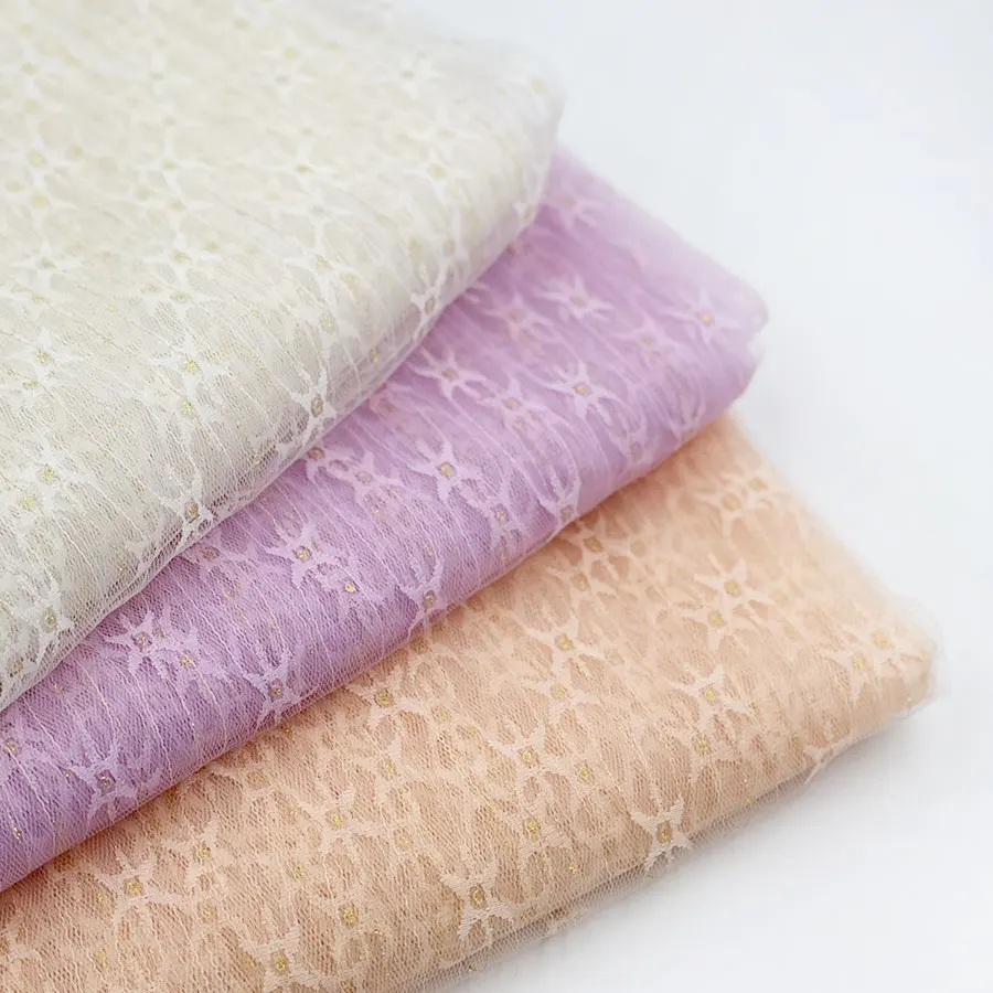 Ready goods wholesale Glitter popular flash jacquard gold thread Bridal nylon fiber tulle mesh knit fabric for bridal veil