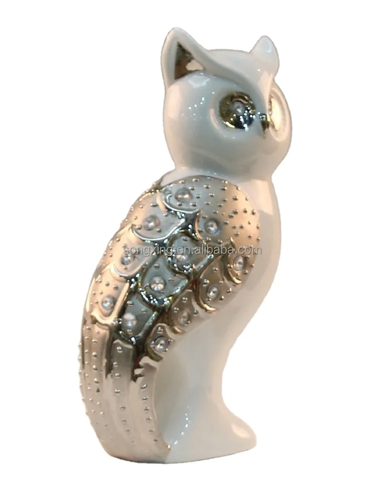 silver ceramic mini piggy bank with black glass