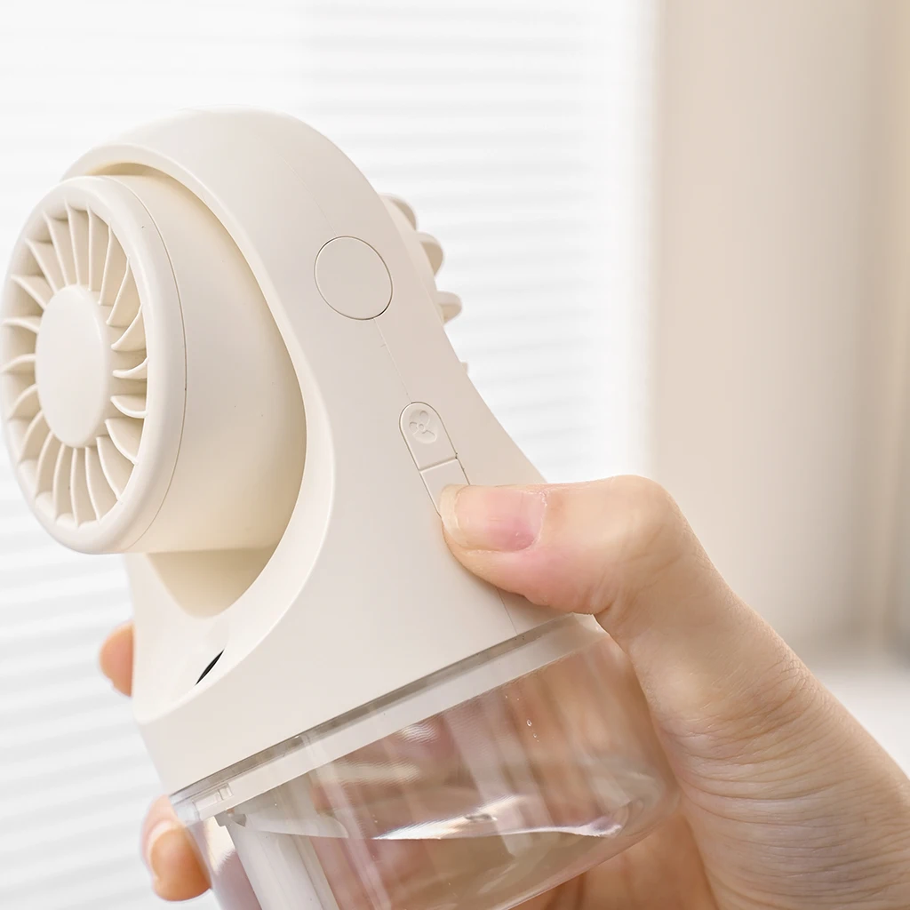2024 New Type-c rechargeable portable pocket small table fan with mist outdoor handheld air cooling plastic mist summer fan
