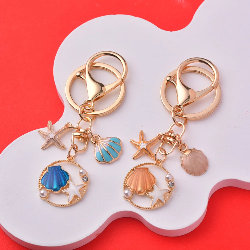 Xinxing Ocean Wind Imitation Pearl Shell Starfish Keychain Alloy Material Drop Glaze Craft Women Bag Pendant Colour Key Chain