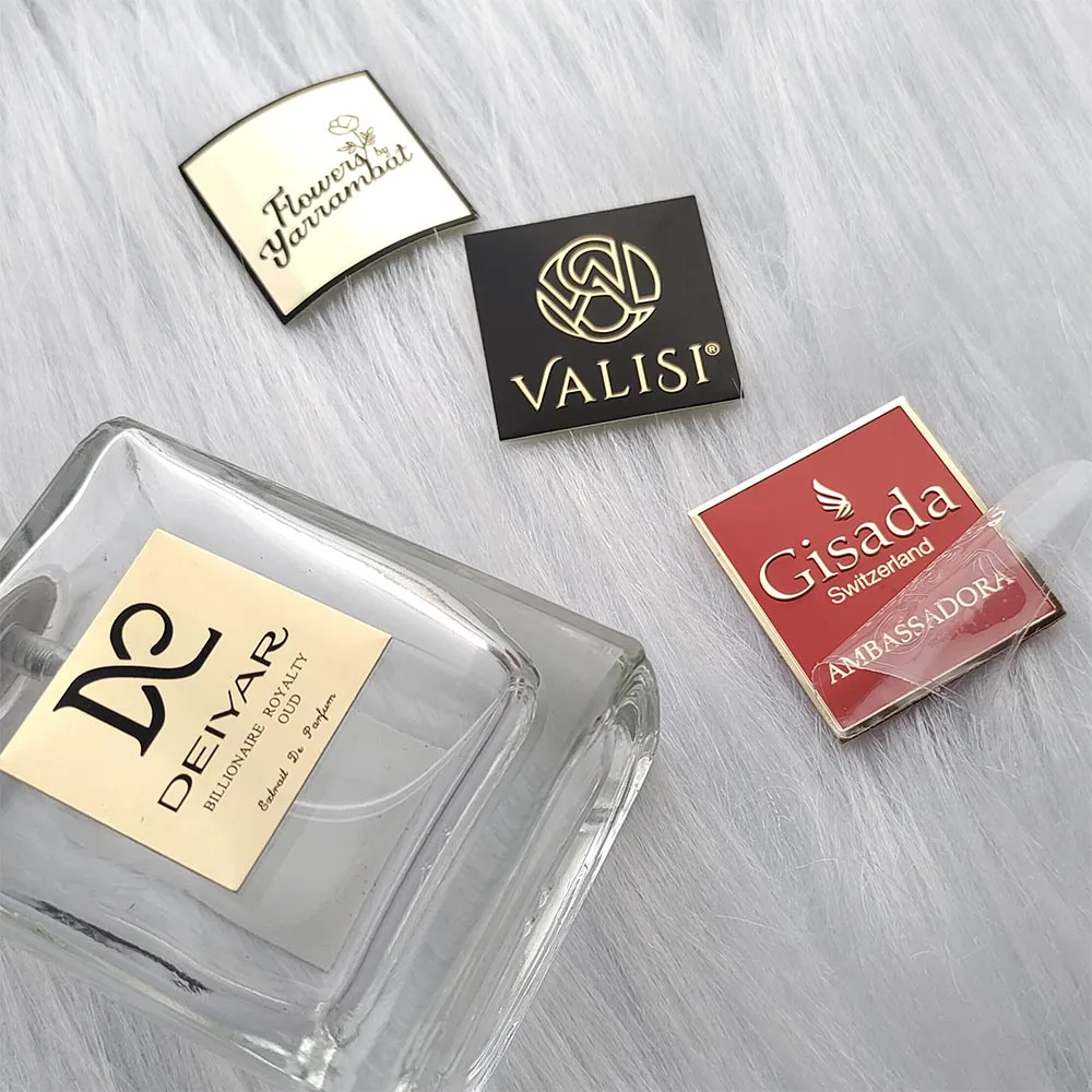 3d embossed black and gold luxury cosmetic packaging clear labels for cosmetic bottles label metal logo plate perfumes