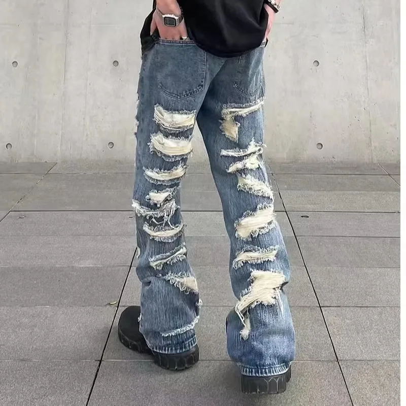 Мужские рваные джинсы в европейском и американском стиле