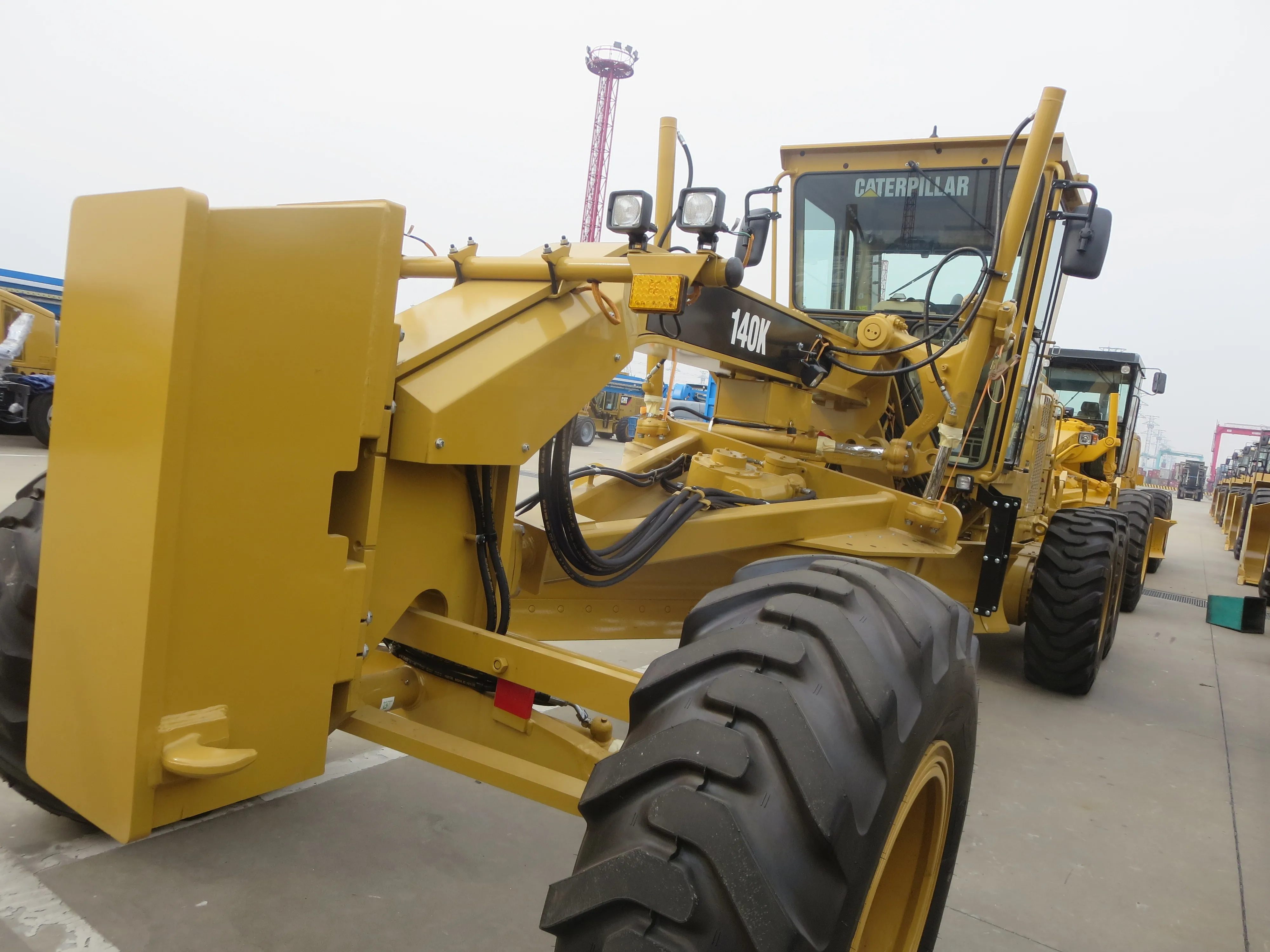 Brand new USA made original Caterpillar 140k motor grader, road construction tractor with blade and fork 140K new