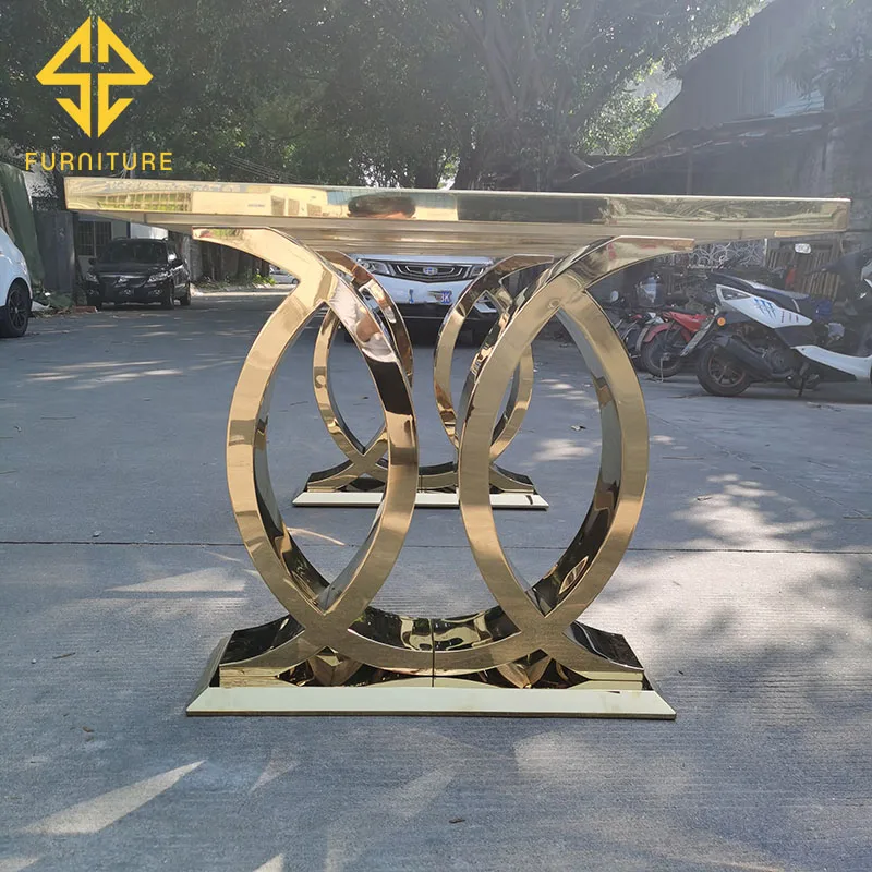 Foshan factory sells new design stainless steel golden dining table at low price, which can be matched with glass table and marb