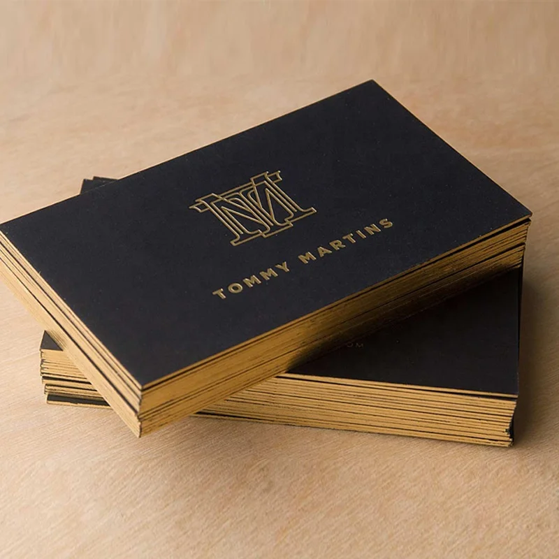 Custom made luxury gold foiled thick black kraft paper business name card with gold edge